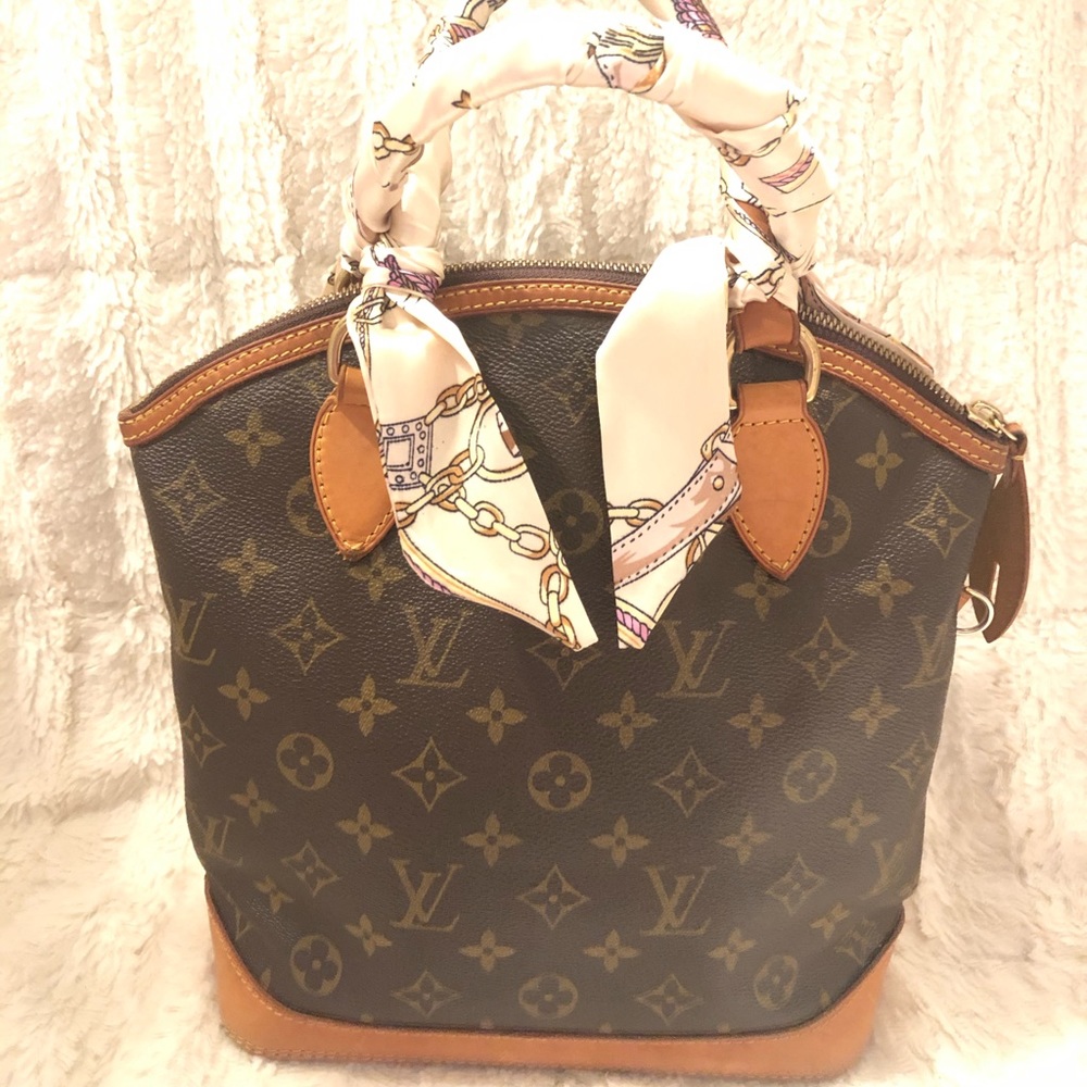 LV Alma vertical tote